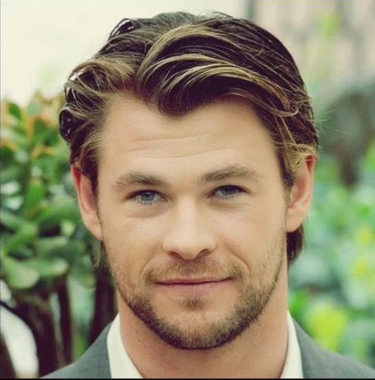 Chris Hemsworth: Widow's Peak Hairstyle
Chris Hemsworth with a textured, medium-length hairstyle that highlights his widow’s peak, styled with volume on top and neatly trimmed sides.
