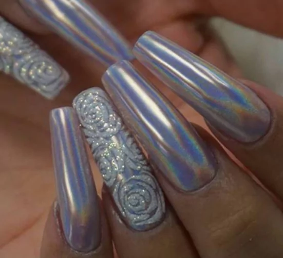 Holographic Chrome Holographic chrome nails with a high-shine, rainbow-reflective finish, perfect for futuristic July nail colors and eye-catching summer styles.