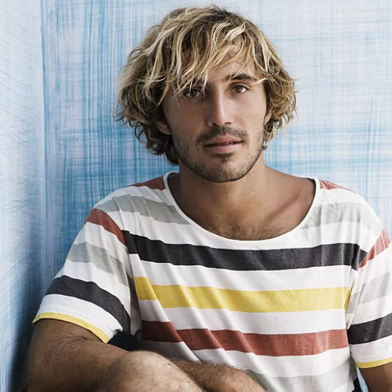 Surfer Shag modern men’s grooming, effortless hairstyles men