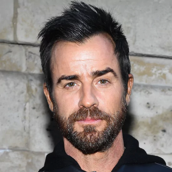 Justin Theroux: Textured Hair With A Widow's Peak
Justin Theroux with a textured hairstyle that highlights his widow’s peak, featuring volume at the front and a defined, natural-looking finish.