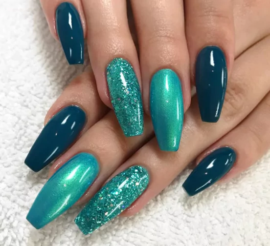 Ocean Teal: The Cooling Shade That's Breaking Instagram Ocean blue short nails with dark French tips and seashell-inspired art details