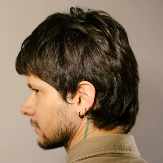 Slicked-Back Medium Cut
stylish medium hairstyles men, best men’s hairstyles