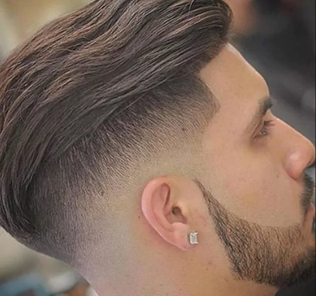 Cool Low Fade Slick Back
Slicked Back Hairstyles For Men