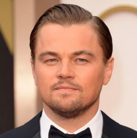 Leonardo DiCaprio: Slicked Back Widow's Peak Style
Leonardo DiCaprio with a slicked-back hairstyle that showcases his widow’s peak, featuring a clean, polished finish and classic Hollywood charm.