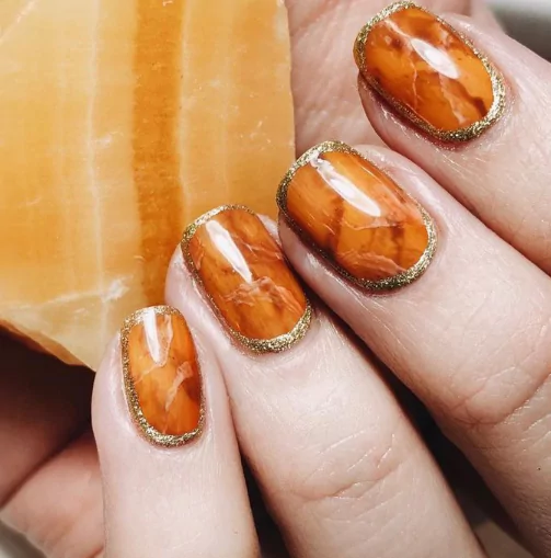 Marble Swirl Effect
burnt orange marble nails, burnt orange and gold nails