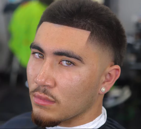 16 Guard Blowout Taper
black men's blowout hairstyle
blowout taper textured fringe